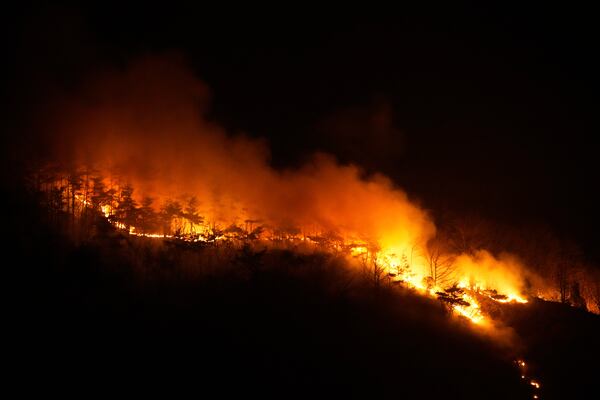 A view of a wildfire burning in the mountain in Cheongsong, South Korea, Thursday, March 27. 2025. (AP Photo/Ahn Young-joon)