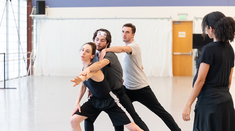 Atlanta Ballet Choreographer-in-Residence Claudia Schreier, right, coaches dancers Ashley Wegmann, Spencer Wetherington and Marius Morawski in a rehearsal for "Nighthawks."
(Courtesy of Shoccara Marcus)
