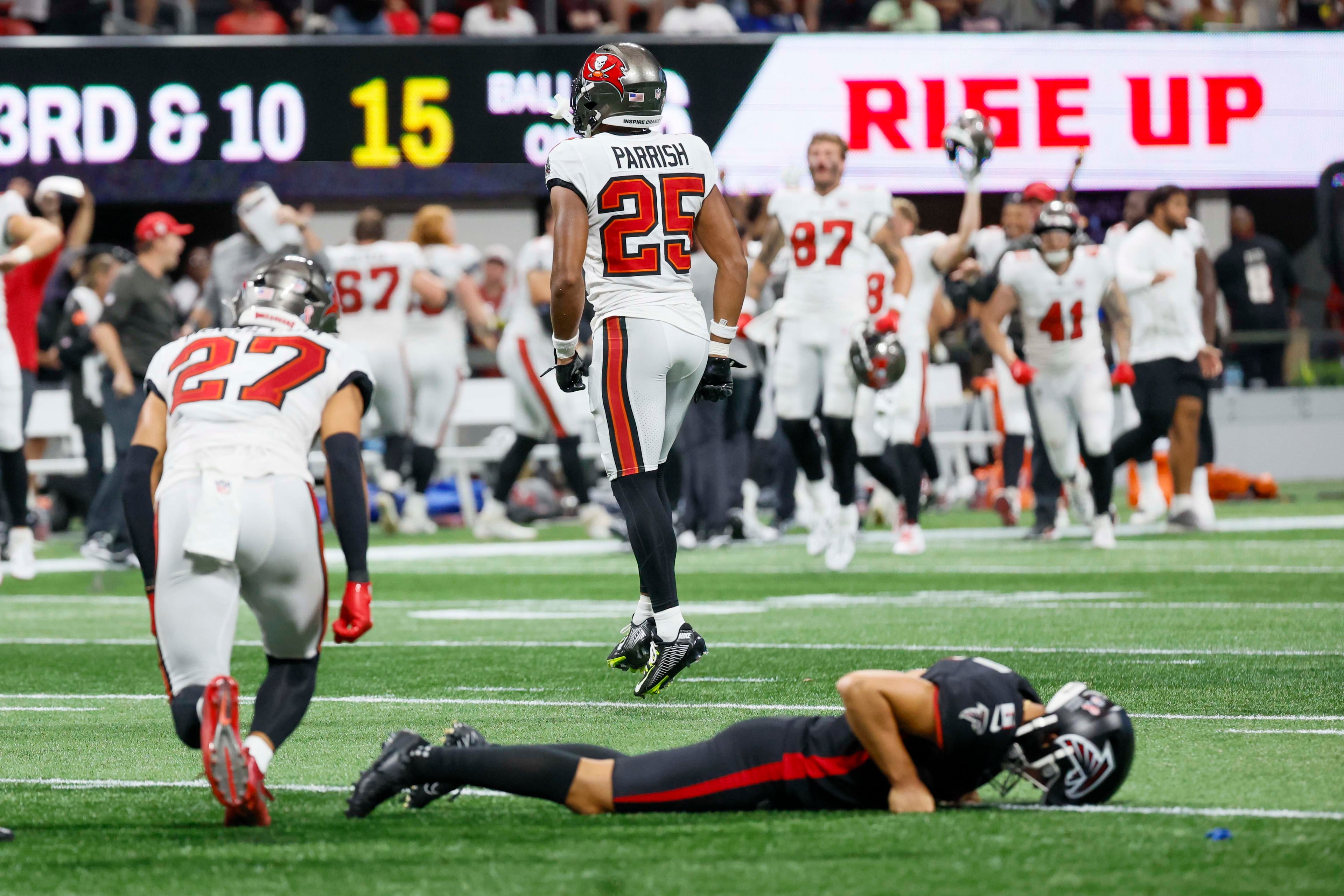 Tampa Bay Buccaneers players celebrate as Atlanta Falcons placekicker Younghoe Koo (6) lies on the ground after missing a last-second field goal. The Atlanta Falcons lost their home opener 23-20 to the Tampa Bay Buccaneers at Mercedes-Benz Stadium on Sunday, September 7, 2025, in Atlanta.
(Miguel Martinez/ AJC)