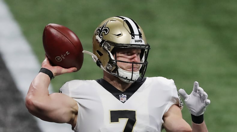 New Orleans Saints quarterback Taysom Hill completes a pass against the Atlanta Falcons during the first quarter on Sunday, Dec. 6, 2020, in Atlanta, Georgia.
Curtis Compton / Atlanta Journal-Constitution/TNS