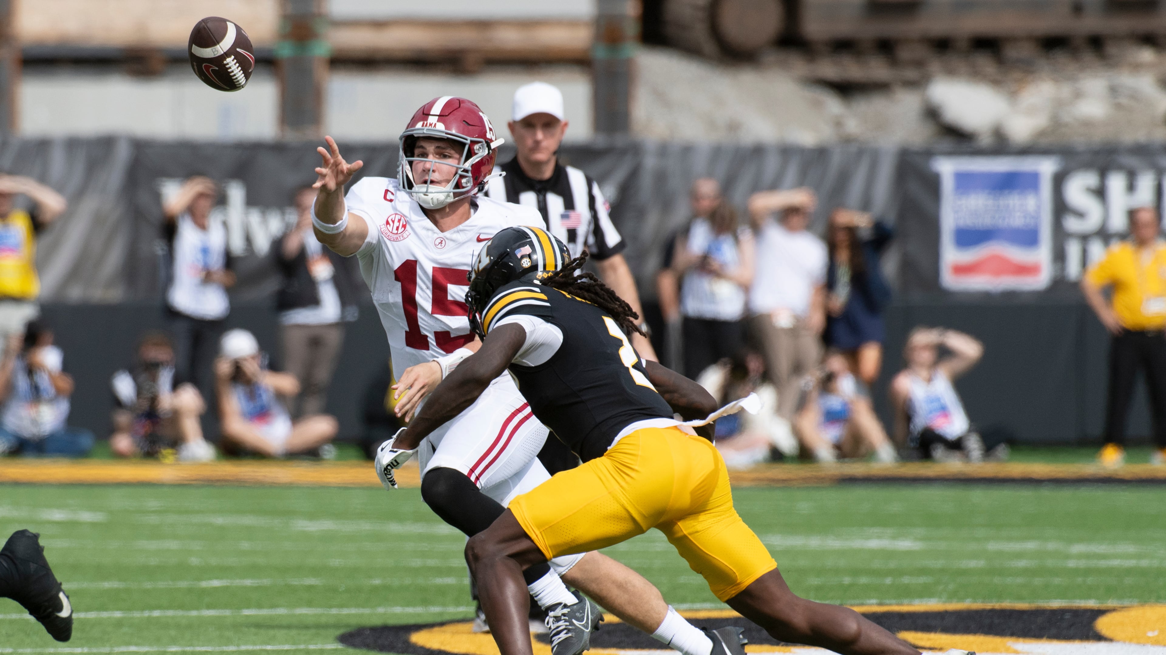 Alabama quarterback Ty Simpson (15) throws a pass over Missouri cornerback Toriano Pride Jr. during the second half an NCAA college football game Saturday, Oct. 11, 2025, in Columbia, Mo. (AP Photo/L.G. Patterson)