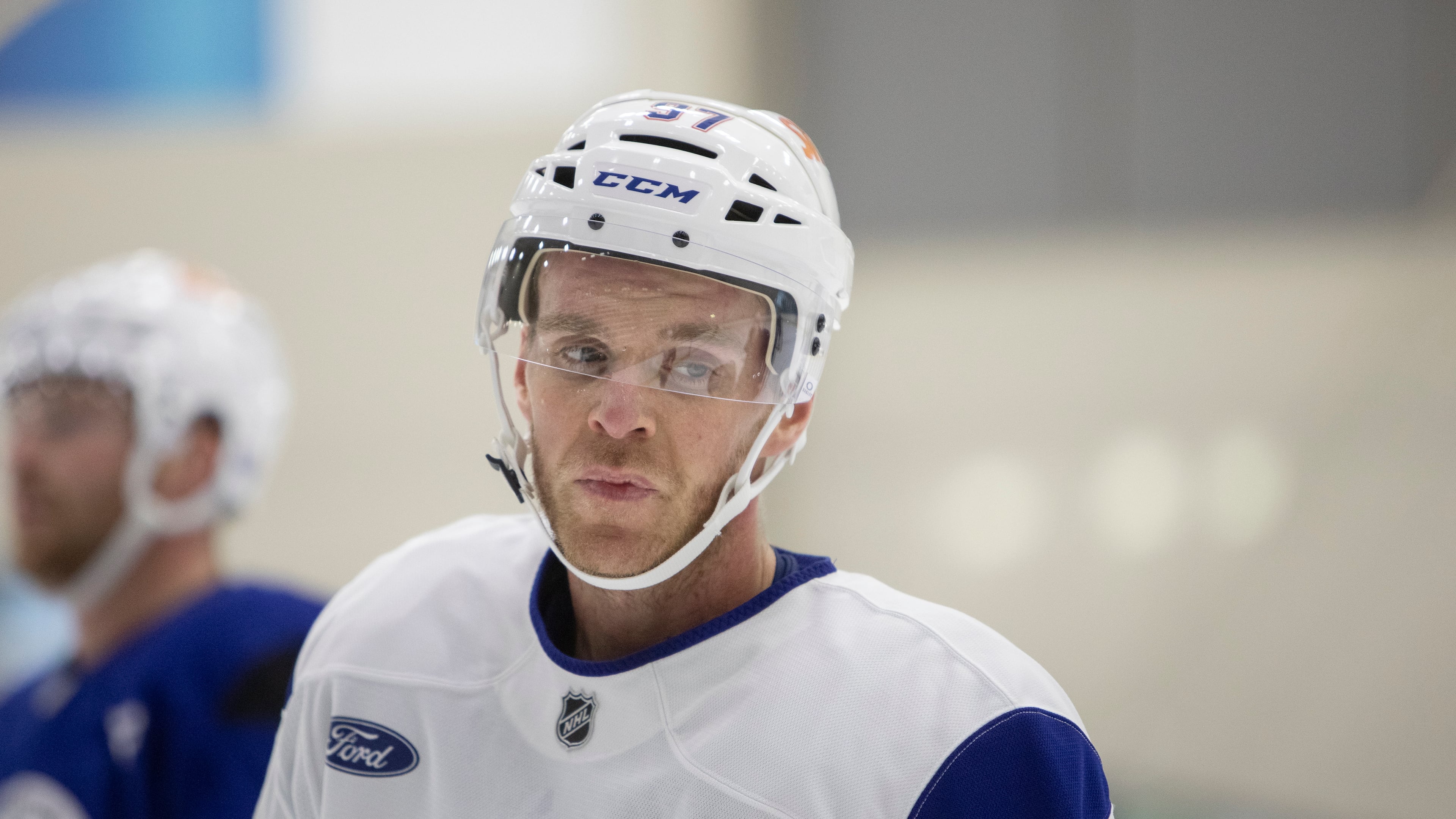 Edmonton Oilers' Connor McDavid (97) looks on during NHL hockey training camp in Edmonton, Alberta, Thursday, Sept. 18, 2025. (Amber Bracken/The Canadian Press via AP)