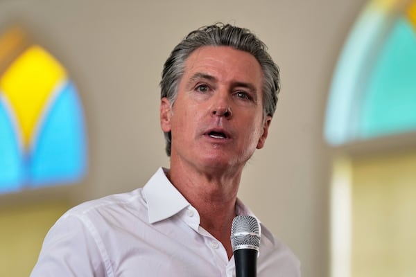 Gov. Gavin Newsom, D-Calif., gives remarks to a crowd at St. Paul First Baptist Church on Wednesday, July 9, 2025, in Laurens, S.C. (AP Photo/Meg Kinnard)