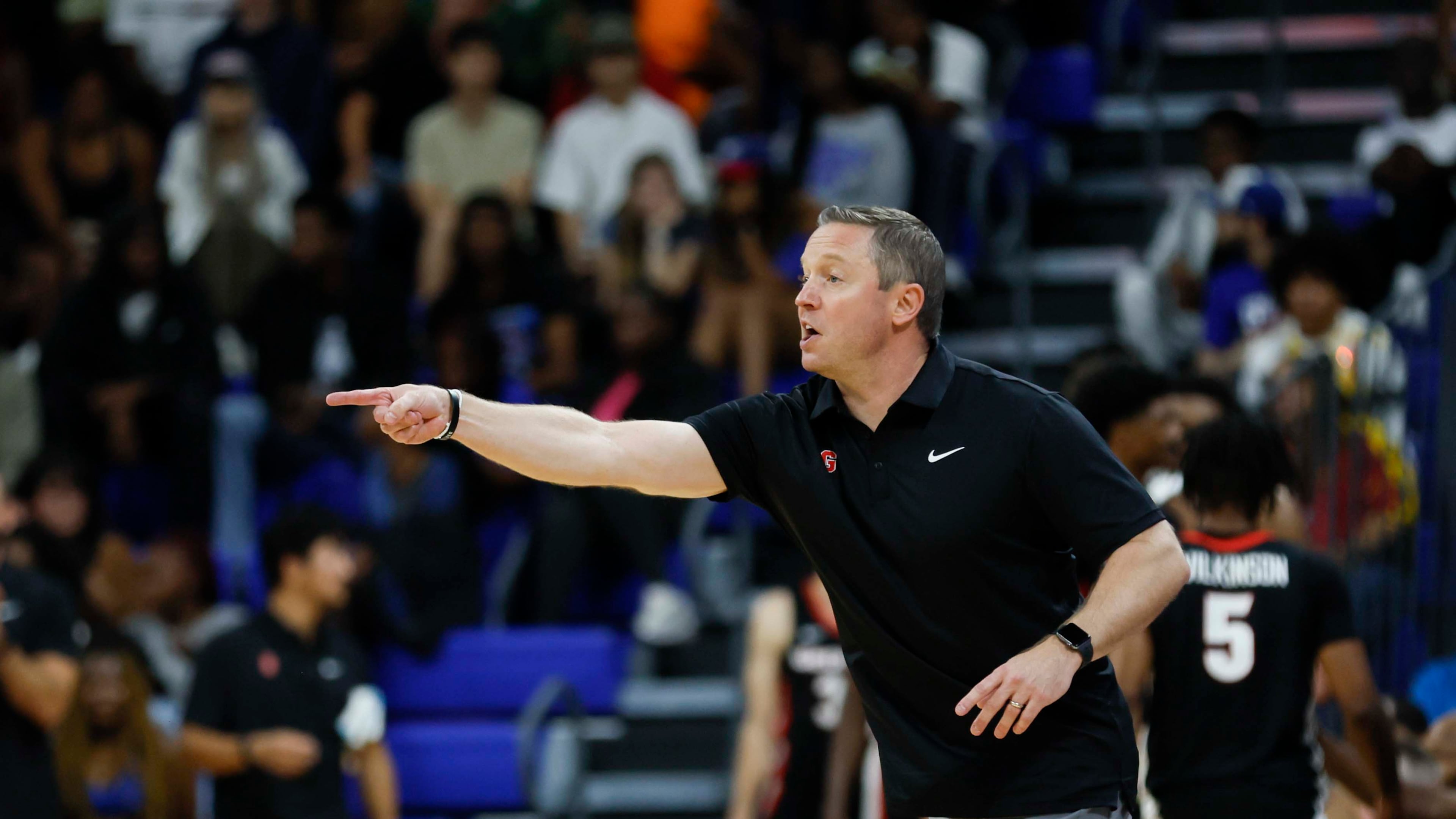 Georgia Bulldogs head coach Mike White gives instructions during the first half of an exhibition opener game against the Georgia State Panthers at the Georgia State Convocation Center, Wednesday, October 15, 2025, in Atlanta. 
(Miguel Martinez/ AJC)