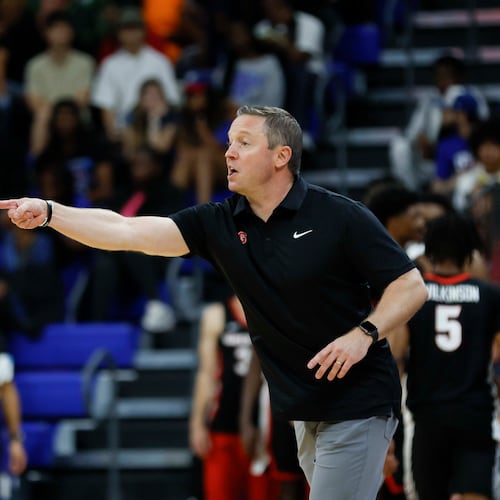 Georgia Bulldogs head coach Mike White gives instructions during the first half of an exhibition opener game against the Georgia State Panthers at the Georgia State Convocation Center, Wednesday, October 15, 2025, in Atlanta. 
(Miguel Martinez/ AJC)