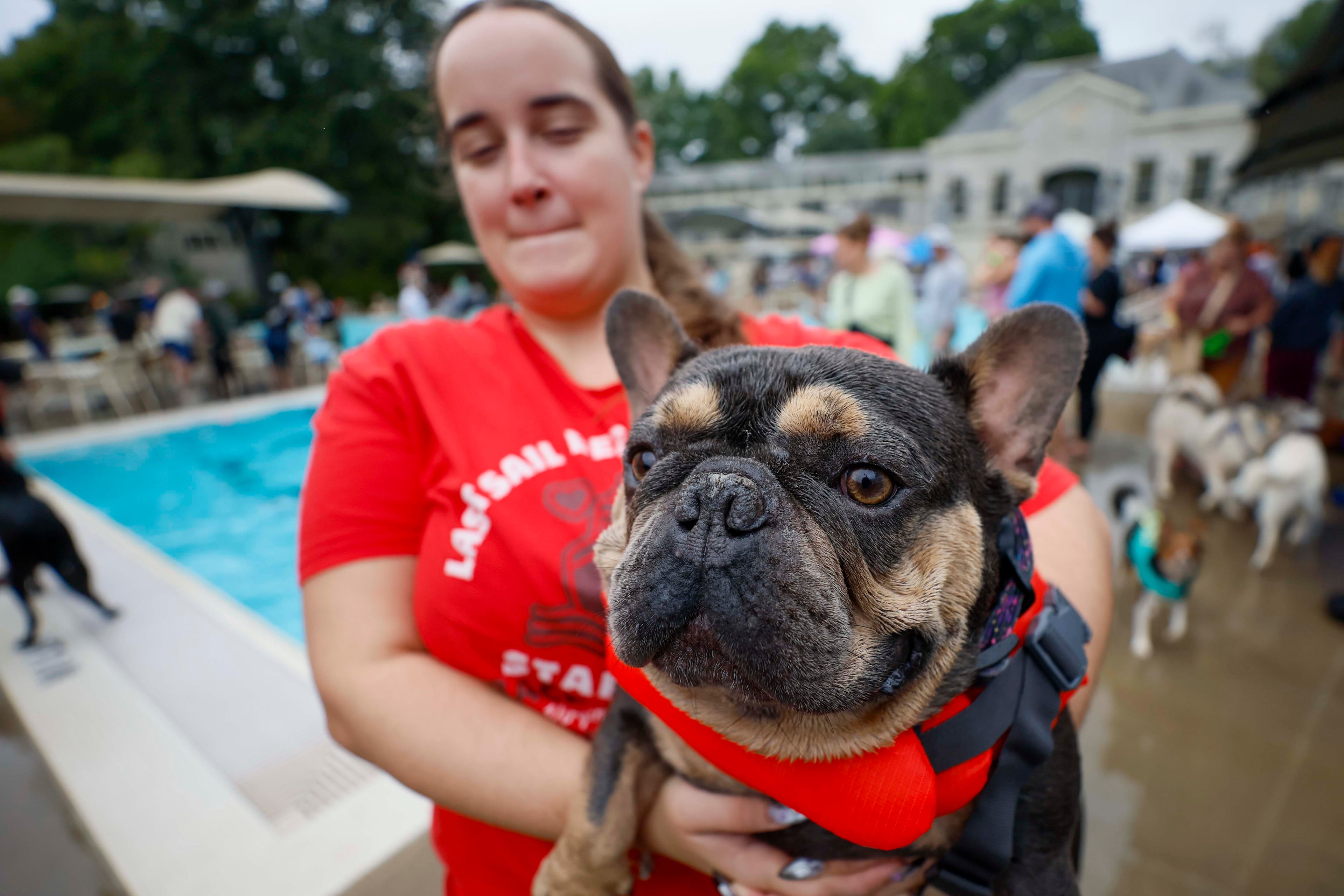 Ashley Starnes from Midtown holds her dog Nibbler (4) during the XV annual Splish Splash Doggie Bash at Piedmont Park on Sunday, October 5, 2025. The proceeds support Piedmont Park Dog Parks.
(Miguel Martinez/ AJC)