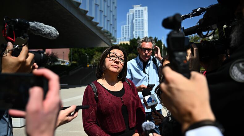 Syrena, a member of the jury speaks outside federal court after a federal judge declared a mistrial in the arson case against the man accused of sparking the deadly 2025 Palisades Fire, Friday June 26, 2026, in Los Angeles. (AP Photo/William Liang)