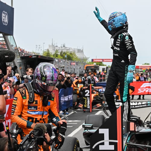 Mercedes driver George Russell, of Britain, waves after winning the sprint race at the F1 Canadian Grand Prix auto race in Montreal, Saturday, May 23, 2026. (Graham Hughes/The Canadian Press via AP)