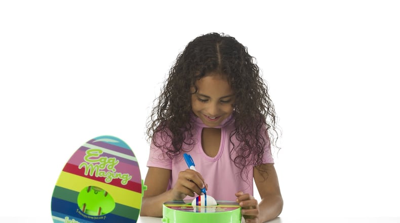Decorating eggs is easy with EggMazing, a kit featuring a spinner and eight brightly colored quick-drying markers. Contributed by Hey Buddy Hey Pal Investments, LLC
