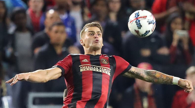 March 5, 2017, Atlanta: Atlanta United defender Leandro Gonzalez Pirez soars to the ball over a N.Y. Red Bulls player during the second half on Sunday, March 5, 2017, in Atlanta. Curtis Compton/ccompton@ajc.com