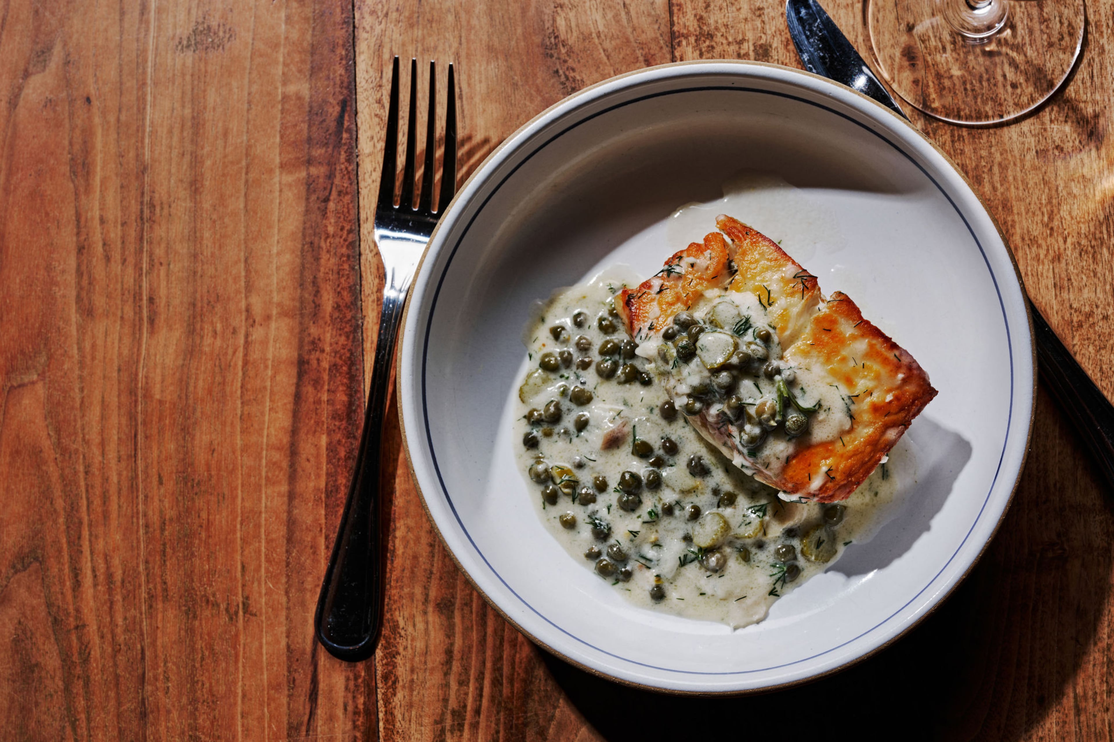 The Optimist offers a fresh daily catch of sustainable seafood simply prepared in the kitchen’s wood-burning ovens and grills. (Courtesy of Andrew Thomas Lee)