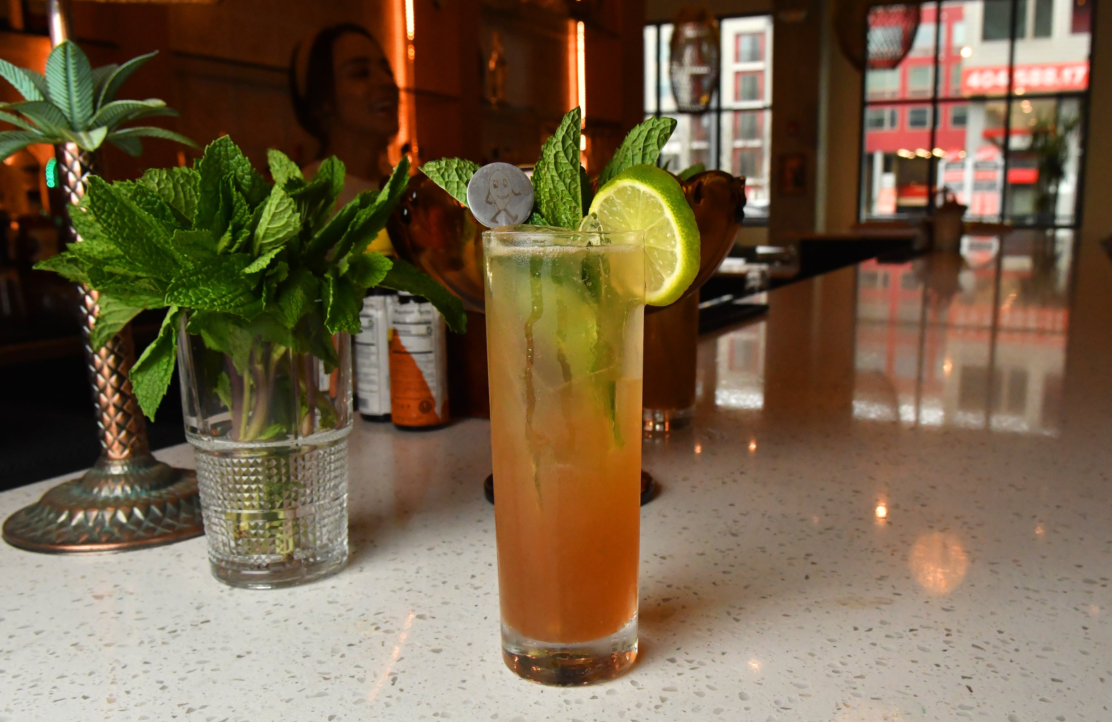 The bar at La Semilla is well-stocked with Iberian and South American wines curated for sustainability, and the staff capably shakes and stirs cocktails befitting the concept. (Chris Hunt for the AJC)