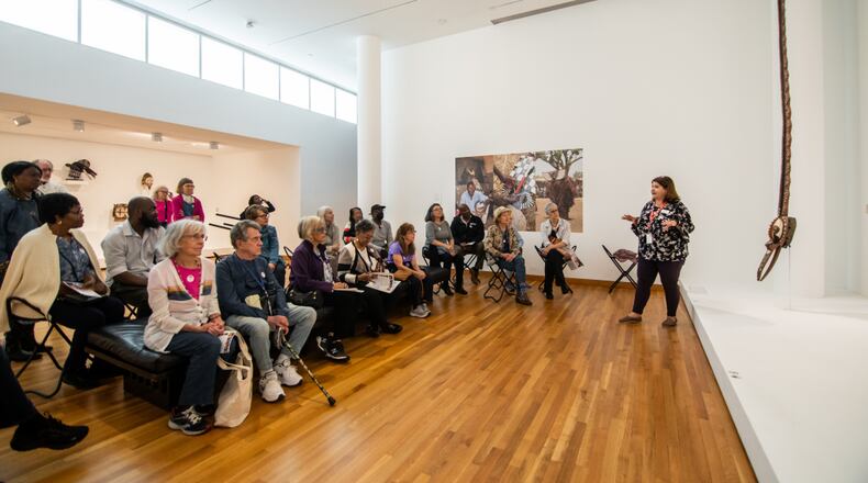 Julia Forbes, associate director of institutional research at the High Museum of Art, guides a conversation about “Nwantantay Mask” by Yacouba Bondé in 2023. 
(Courtesy of High Museum/Alphonso Whitfield)
