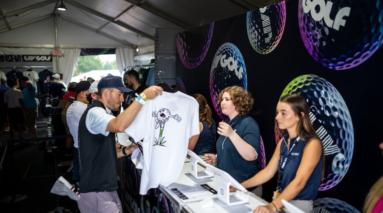 FILE — People purchase merchandise during the LIV Golf event at Trump National Golf Club Bedminster in Bedminster, N.J., July 28, 2022. (Doug Mills/The New York Times)