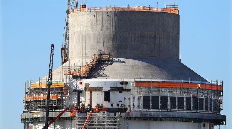Construction is seen on the exterior of Unit 4 at Plant Vogtle on Dec 14, 2021, in Waynesboro, Georgia. “Curtis Compton / Curtis.Compton@ajc.com”`