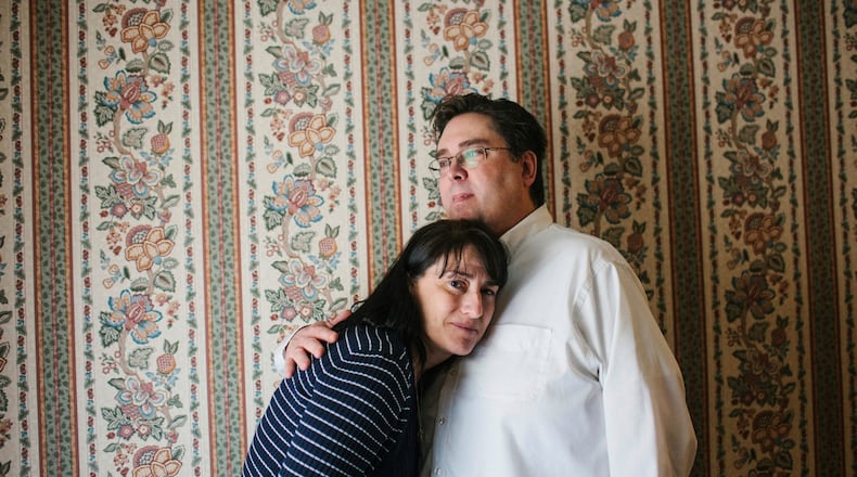 PORTLAND, ME - APRIL 25: Sue Ellen Monaghan rests her head on Jon Claflin's chest, listening to his heart in Portland, ME on Saturday, April 25, 2015. Monaghan's son, Tim Conley, was an organ donor, and when he passed away last fall at work, five of his organs went to people on transplant lists, including Claflin. Conley's heart saved Claflin's life. (Photo by Whitney Hayward/Portland Press Herald via Getty Images)