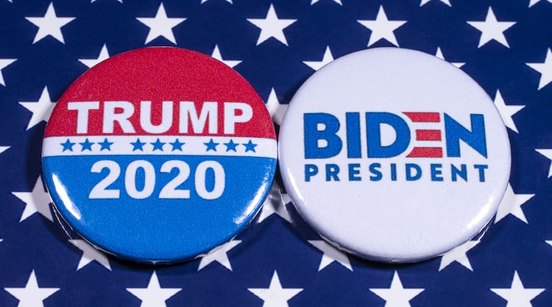 Trump and Biden pins (Dreamstime/TNS)