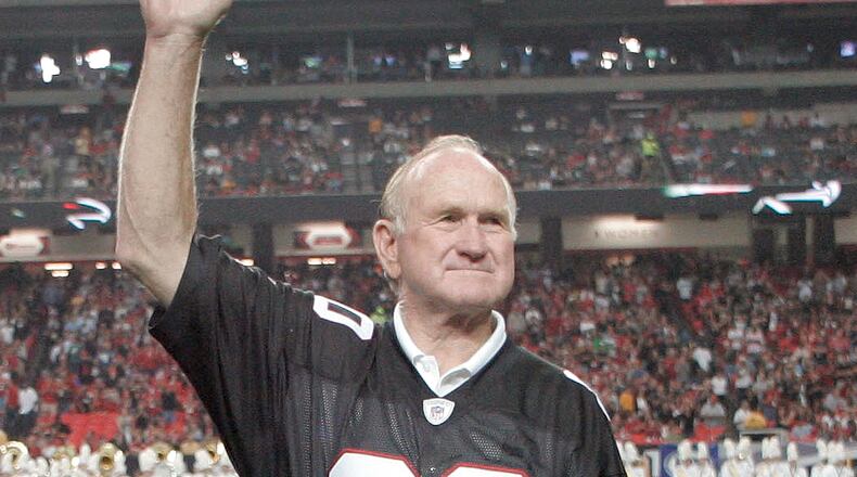 "Mr. Falcon" Tommy Nobis acknowledges the fans' cheers during a 2009 ceremony. (AP Photo/John Amis, File)