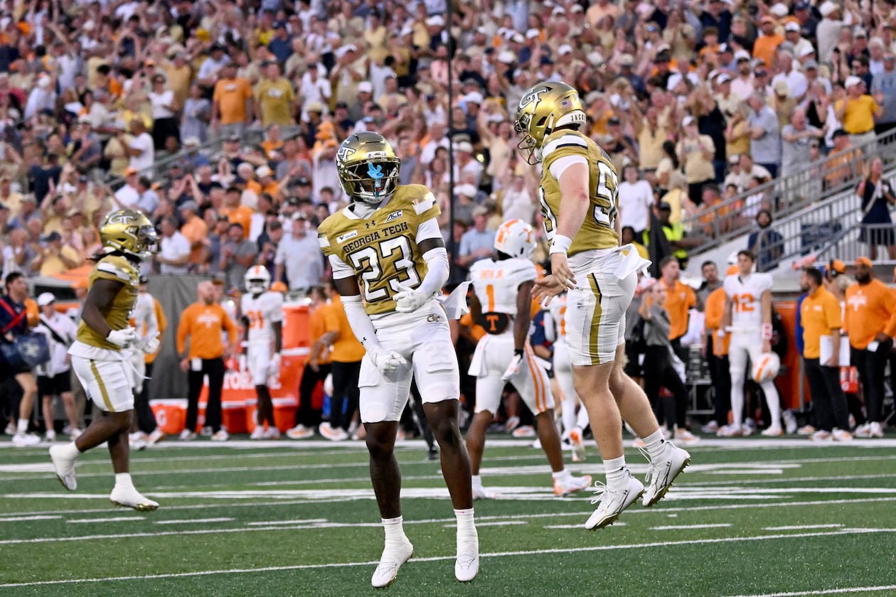 Georgia Tech defensive back Trae Stevenson Jr. (23) celebrates after scoring by Georgia Tech defensive back Elgin Sessions (not picgured) during the first half of an NCAA college football game at Bobby Dodd Stadium on Saturday, Sept. 12, 2026, in Atlanta.(Hyosub Shin/AJC)