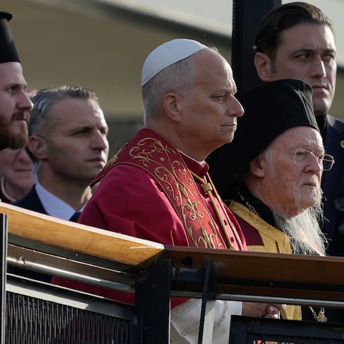 Pope Leo XIV, left, and Ecumenical Patriarch Bartholomew I, the spiritual leader of the world's Eastern Orthodox Christians arrive for an Ecumenical prayer service at archaeological excavations of the ancient Byzantine-era Christian Saint Neophytos Basilica, in Iznik, Turkey, Friday, Nov. 28, 2025, marking the 1,700 years anniversary of the Council of Nicaea. (AP Photo/Khalil Hamra)