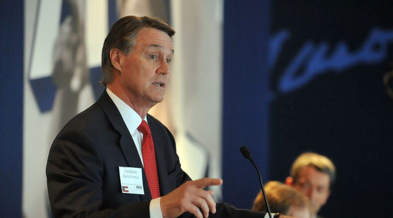 FEBRUARY 18, 2014 ATLANTA Candidate David Perdue gives opening remarks. Six candidates for the Republican primary were present for a panel at the 755 Club at Turner Field for a forum in conjunction with the 24th Annual Small Business Day at the Capitol, Tuesday, February 18, 2014. KENT D. JOHNSON / KDJOHNSON@AJC.COM