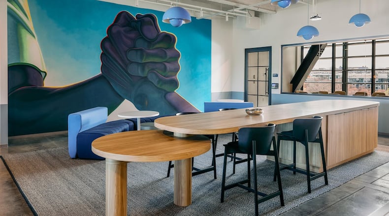 One of dozens of works by early and midcareer artists installed at the Mailchimp headquarters in Atlanta is Alex Gardner’s "Friends with the Bouncer" (2023). Courtesy of Wink Creative/Albrica Tierra