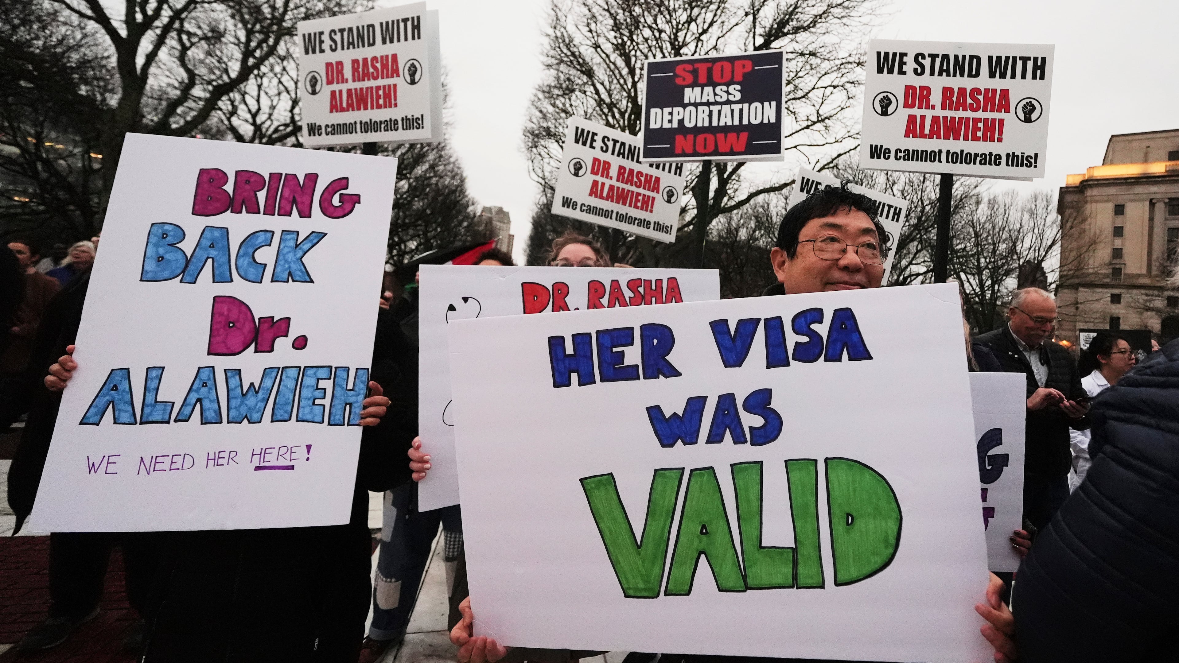 FILE - Protesters rally outside the Rhode Island State House in support of deported Brown University Dr. Rasha Alawieh, March 17, 2025, in Providence, R.I. (AP Photo/Charles Krupa, File)
