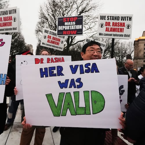 FILE - Protesters rally outside the Rhode Island State House in support of deported Brown University Dr. Rasha Alawieh, March 17, 2025, in Providence, R.I. (AP Photo/Charles Krupa, File)