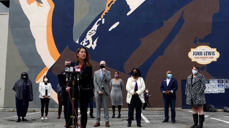 State Rep. Bee Nguyen, D-Atlanta, speaks Tuesday at a press conference at the John Lewis mural on Auburn Avenue in downtown Atlanta. Democratic lawmakers announced the introduction of two bills that would restore the right to vote to felons in Georgia. (Rebecca Wright for the Atlanta Journal-Constitution)