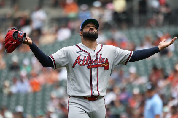 Braves pitcher Reynaldo López thanks the baseball gods during a July start in Baltimore. (Daniel Kucin Jr./AP)