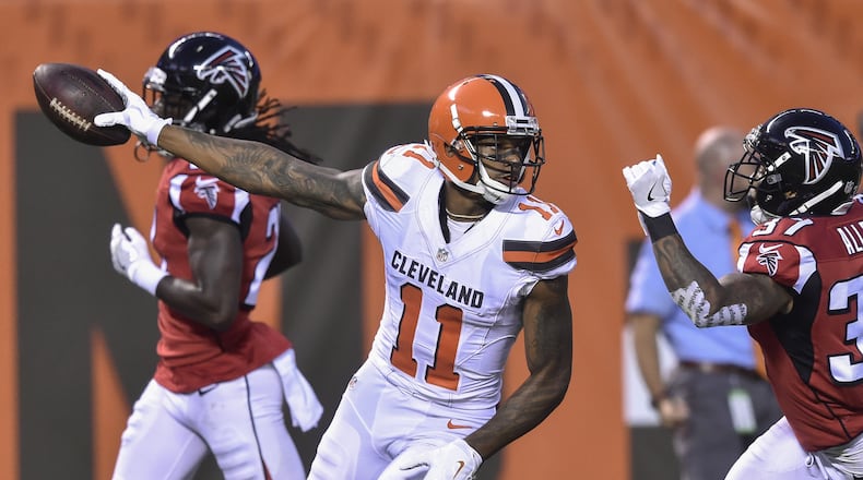 Cleveland Browns wide receiver Terrelle Pryor (11) holds out the football after scoring a touchdown during the first half of an NFL preseason football game against the Atlanta Falcons, Thursday, Aug. 18, 2016, in Cleveland. (AP Photo/David Richard)