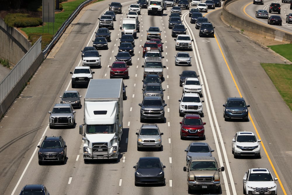 Automobiles travel in traffic along the connector in Atlanta.