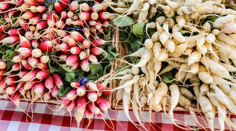 Leah Galante, MS, RDN, LD works as an outpatient dietitian for Northside Hospital and Georgia Tech and regularly shopts at the Peachtree Road Farmer's Market. She points out specific items available at local farmer's markets that offer healthy choices. Galante looks for a wide variety of colorful vegetables to provide antioxidents, nutients and healthy options. Turmeric, colorful lettuces, radishes, beets, garlic, ginger and dozens of other options are available. (Jenni Girtman / Atlanta Event Photography)