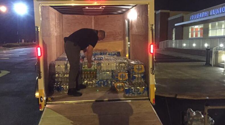 The Acworth Police Department loading up for its trip to deliver water to the Gatlinburg area last week.