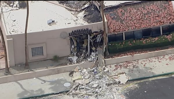 Debris covers the ground after an explosion on Saturday, May 17, 2025 in Palm Springs, Calif. (ABC7 Los Angeles via AP)