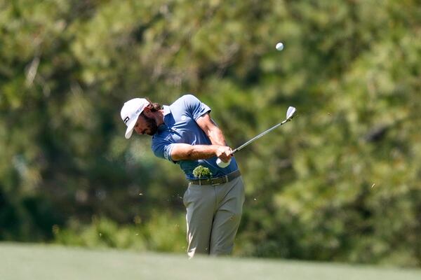 Max Homa hits from the 17th fairway during a practice round at the Masters golf tournament, Tuesday, April 8, 2025, in Augusta, Ga. (AP Photo/Matt Slocum)