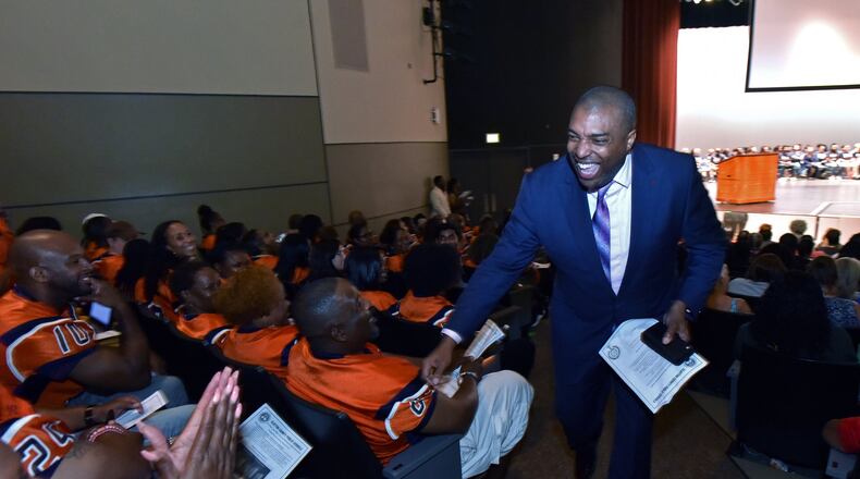 Clayton school Superintendent Morcease Beasley greets county teachers during a district kickoff Tuesday at the Clayton County Performing Arts Center in Jonesboro. HYOSUB SHIN / HYOSUB.SHIN@AJC.COM