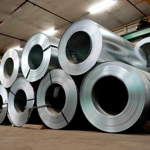 Steel coils, which will be made into roofing, siding and HVAC products, are seen in the manufacturing plant at Ideal Roofing in Ottawa, on Tuesday, Aug. 25, 2026. (Justin Tang/The Canadian Press via AP)