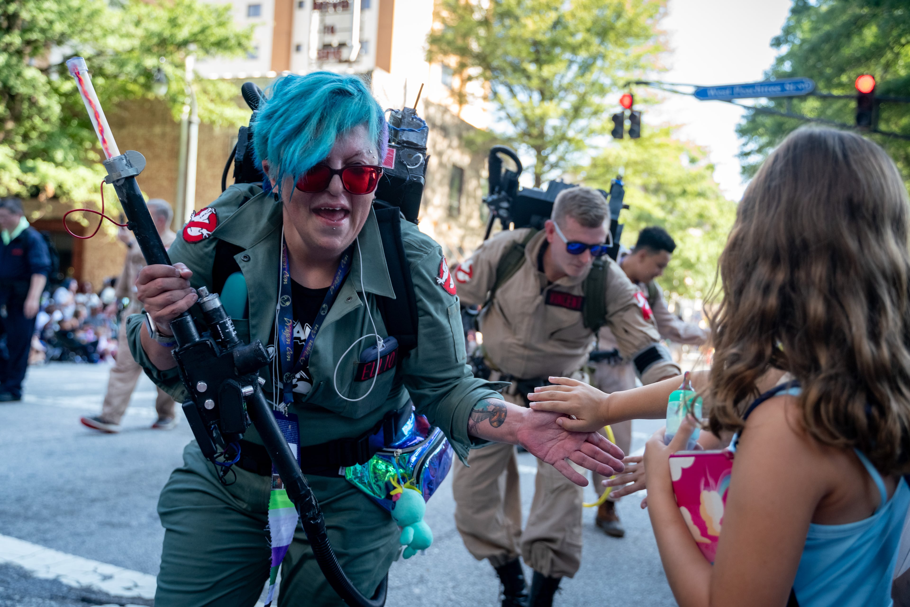 Thousands lined up along Peachtree Street on Saturday morning, August 31, 2024, for the annual Dragon Con parade in Atlanta. For five days, Atlanta is going to be the epicenter of pop culture and an estimated 70,000 people are expected to partake in the annual multi-genre convention. (Ben Hendren for The Atlanta Journal-Constitution)