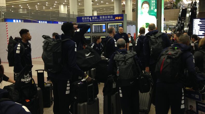 Georgia Tech basketball players and staff congregate in Shanghai Pudong International Airport on Saturday, Nov. 4, 2017 after claiming their baggage. (Photo by Ken Sugiura/AJC Staff)