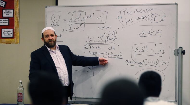 Muhammad Ninowy teaches a class in the “Islamic Creed”, or “Aqeeda”, at the Madina Institute in Duluth. The Institute offers several seminary certificate programs for young Muslims who wish to learn more about their religion. Community leaders say having American born, American trained religious leaders is important to the community and a bulwark against potential radicalization. BOB ANDRES /BANDRES@AJC.COM