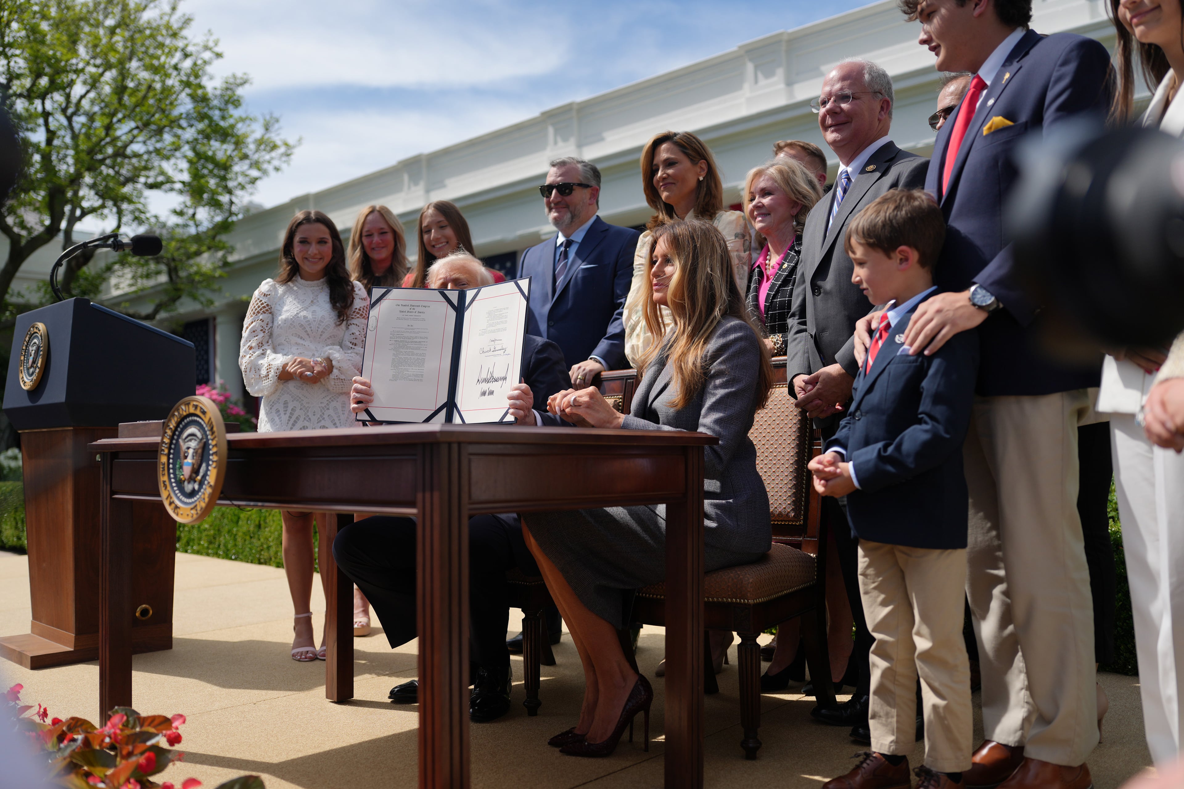 First lady Melania Trump joins President Donald Trump as he signs the Take It Down Act. (Eric Lee/The New York Times)