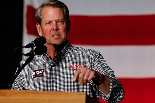 Gov. Brian Kemp speaks to supporters at a campaign rally at Cobb County International Airport on Monday, November 7, 2022. (Natrice Miller/natrice.miller@ajc.com)  