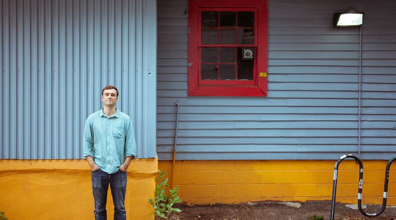 Chris Appleton, executive director of WonderRoot, is standing in front of the organization’s community arts center that provides studio space to artists. JASON TRAVIS