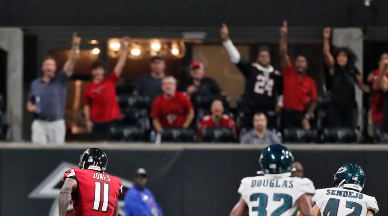 Falcons wide receiver Julio Jones (11) runs for the winning touchdown.