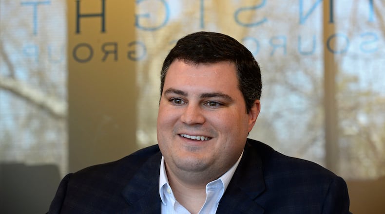 Insight Sourcing Group's KirkPoucher talks about the company's values during an interview at the firm's Norcross headquarters.