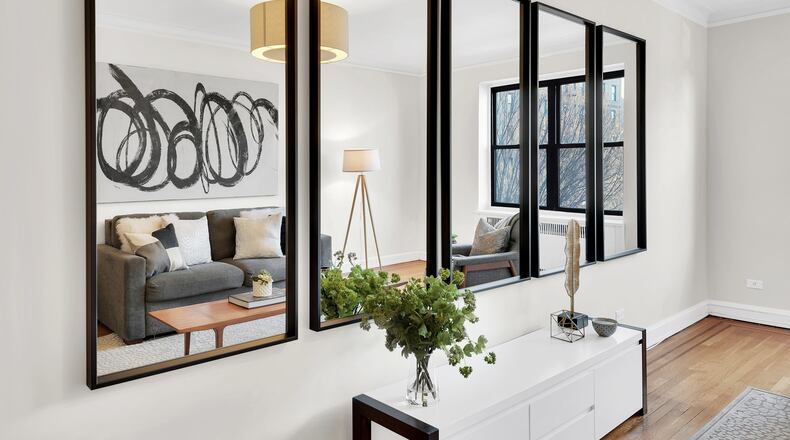 Simple mirrors in a series can be an affordable solution to traditional artwork. (Design Recipes)