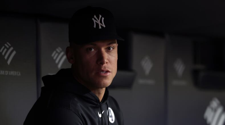 New York Yankees right fielder Aaron Judge (99) looks on from the dugout during the seventh inning of a baseball game against the Cleveland Guardians, Tuesday, June 2, 2026, in New York. (AP Photo/Adam Hunger)