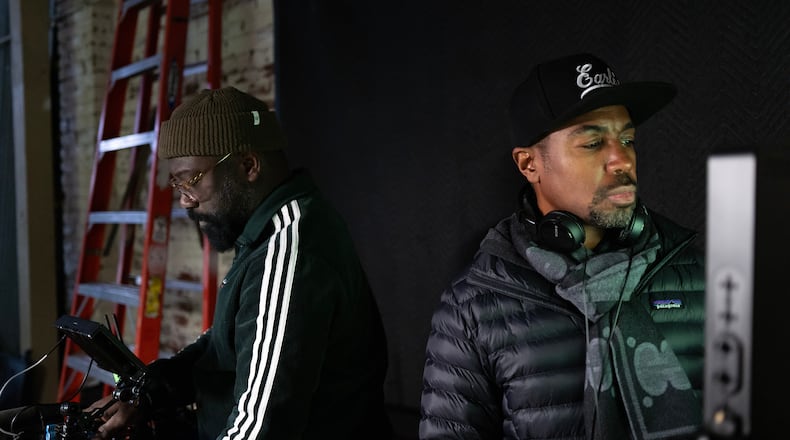 Writer and producer Prentice Penny (r.) makes his feature directorial debut with the three-part Hulu documentary "Black Twitter: A People's History." Disney