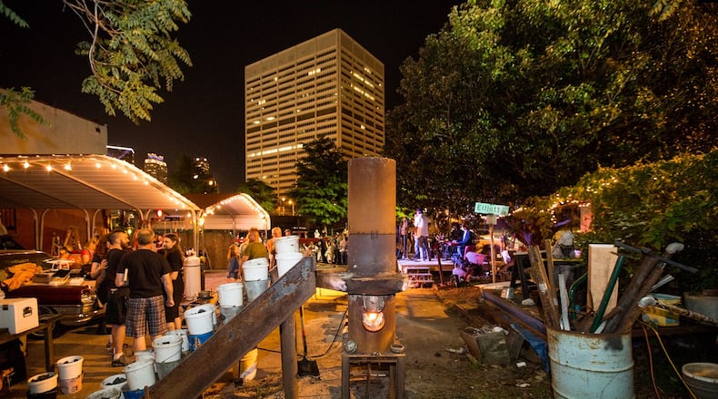 The Atlanta Metal Arts organization is at Castelberry Hill's Elliott Street Pub for a monthly iron pour. Participants are invited to etch their own scratch blocks in iron before the molten metal is poured to make personal art and sculpture. (Jenni Girtman / Atlanta Event Photography)